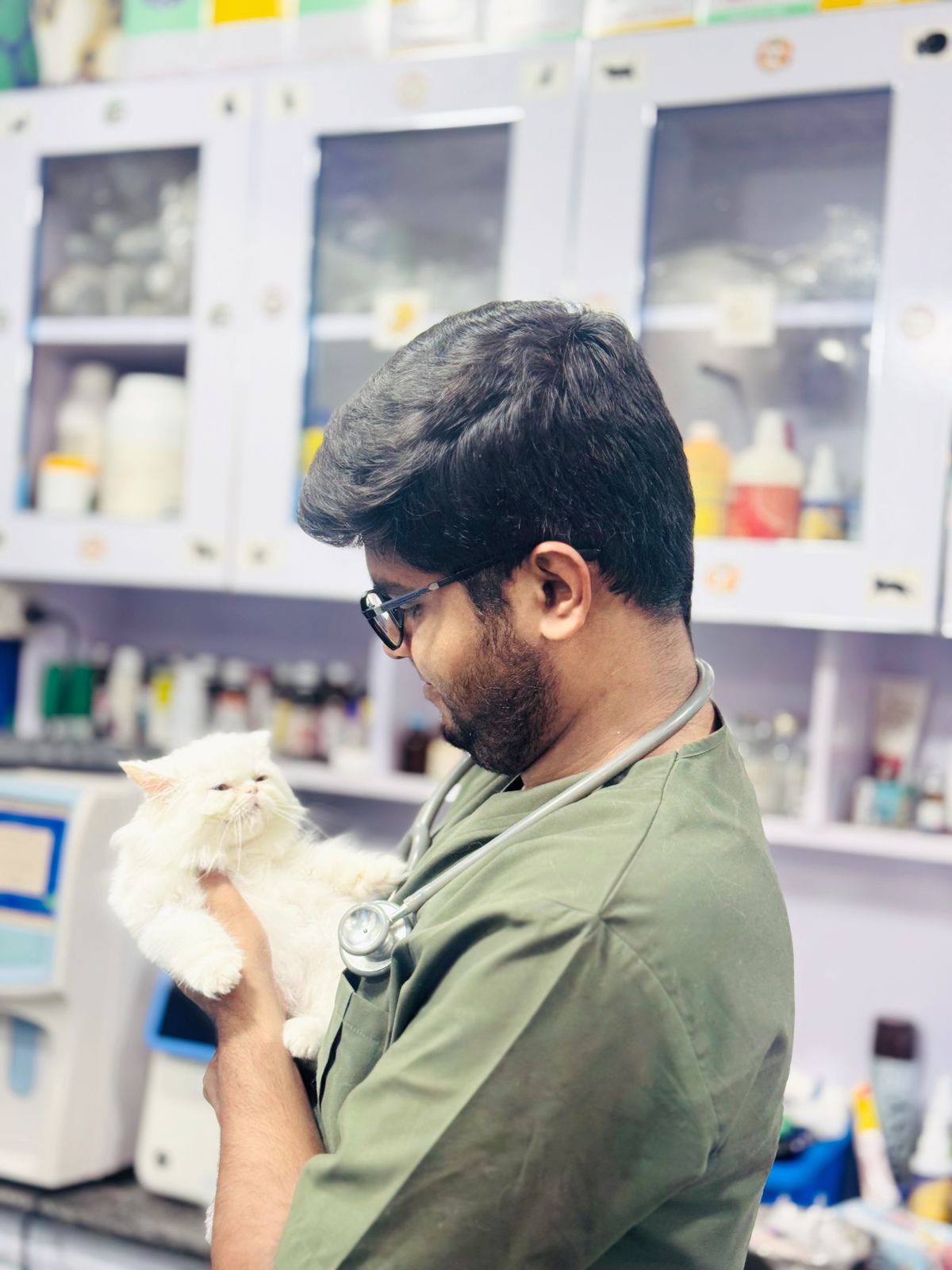 Dr. Mughees providing care in the clinic